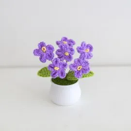 Purple Crochet forget me not flowers in pot