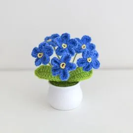 Blue crochet dont forget me flowers in a pot