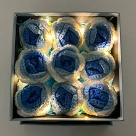 9 blue crochet rose in light up square box