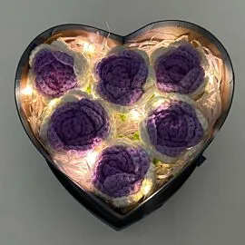 6 purple crochet roses in heart shape light up box