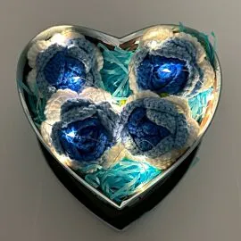 4 blue crochet roses in heart shape light up box