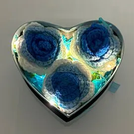 3 blue crochet roses in heart shape light up box