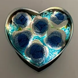 6 blue crochet roses in heart shape light up box