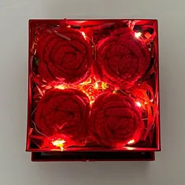 4 red crochet roses in light up square box