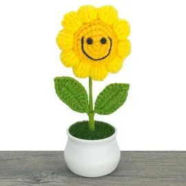 smiling crochet sunflower in pot