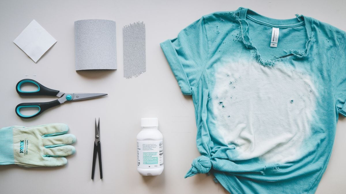 a distressed t-shirt and tools to make western tshirts