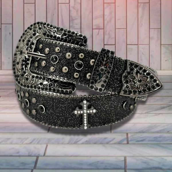 black rhinestone western belt on tile surface