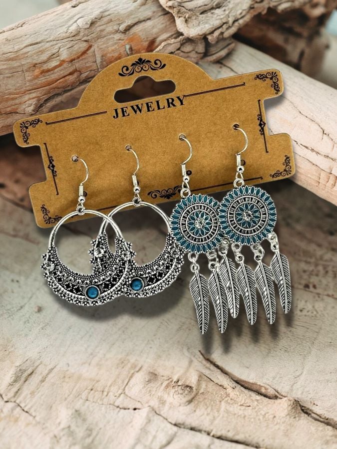 western earrings on card display